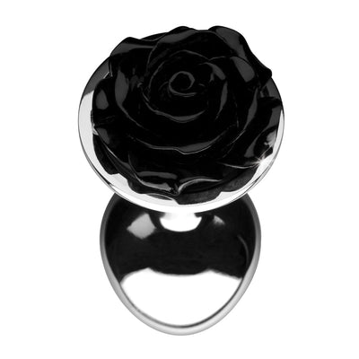 Small metal butt plug with a shiny silver base and a detailed black rose design on top.