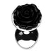 Small metal butt plug with a shiny silver base and a detailed black rose design on top.