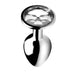 Small silver metal anal plug with a clear faceted gem at the base, smooth tapered design for comfortable wear.