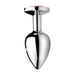 Medium-sized smooth metal anal plug with tapered shape and pink gem base detail on white background.