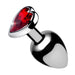Small silver metal anal plug with a red heart-shaped gem at the base, polished smooth finish.