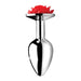 Small silver metal anal plug with a decorative red rose flower at the base, polished smooth finish.