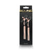 Rose gold adjustable nipple clamps with black silicone tips and decorative tassels in black packaging.