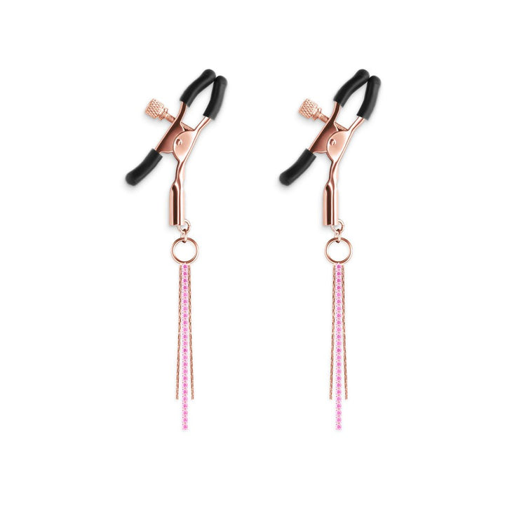 Pair of rose gold adjustable nipple clamps with black silicone tips and pink decorative chains.