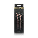 Rose gold adjustable nipple clamps with black silicone tips and pink rhinestone chain accents in black packaging.