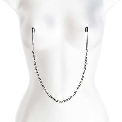 Black metal nipple clamps with soft silicone tips connected by a delicate chain displayed on a white mannequin torso.