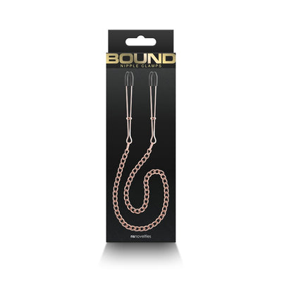 Bound DC3 adjustable nipple clamps with soft silicone tips and rose gold chain on black packaging.