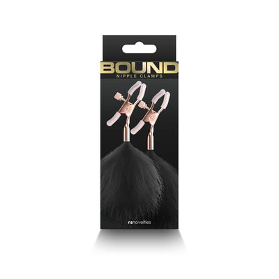 Bound F1 nipple clamps with rose gold metal and soft black feather accents in retail packaging.