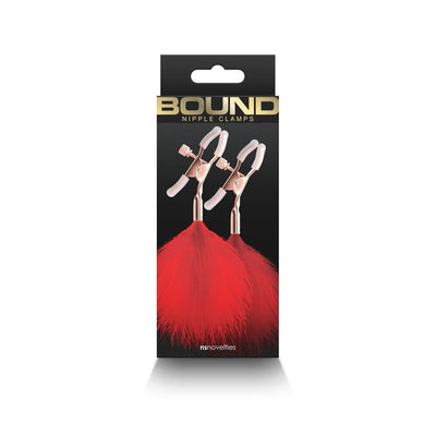 Rose gold adjustable nipple clamps with soft silicone tips and red feather accents in black packaging.
