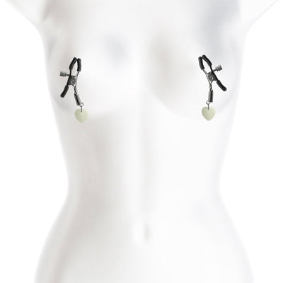 Gunmetal adjustable nipple clamps with soft silicone tips and heart-shaped charms on a white mannequin torso.