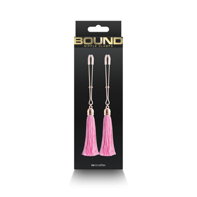 Bound T1 adjustable nipple clamps with soft silicone tips and pink tassels in black packaging.