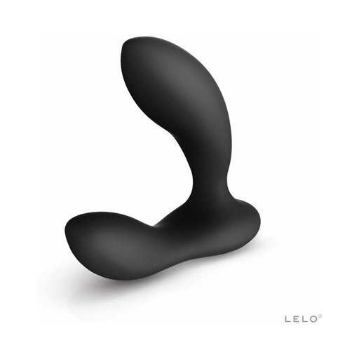 Black ergonomic prostate vibrator with curved tip and base, made of smooth silicone, displayed on white background.