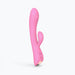 Pink dual stimulator with ergonomic design, featuring separate clitoral and internal arms and control buttons on the handle.