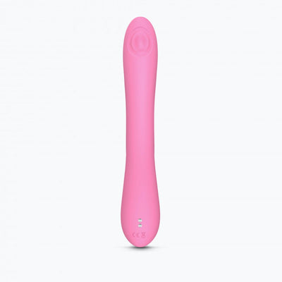 Pink sleek dual stimulator with ergonomic design and smooth silicone surface, standing upright on white background.