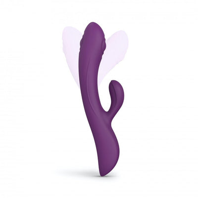 Purple dual stimulator with ergonomic curved design and smaller external arm, shown with motion effect on white background.