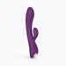Purple dual stimulator with curved shaft and smaller external arm, ergonomic design with control buttons at base.