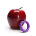 Purple soft silicone ring displayed next to a shiny red apple on a white background.