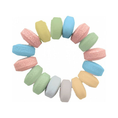 Set of colorful candy-inspired cock rings arranged in a circle on a white background.
