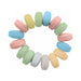 Set of colorful candy-inspired cock rings arranged in a circle on a white background.