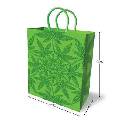 Small green gift bag with glitter cannabis leaf pattern and green woven handles, measuring 10.75 by 7.75 by 4 inches.