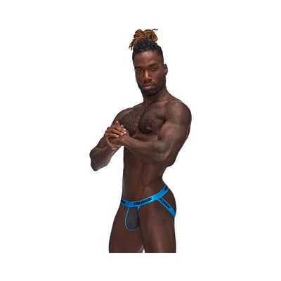 Athletic male model wearing gray Casanova Uplift Jock with blue waistband and supportive seamed pouch on white background.