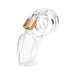 Clear medical-grade polycarbonate male chastity device with brass padlock securing the vented cage design.