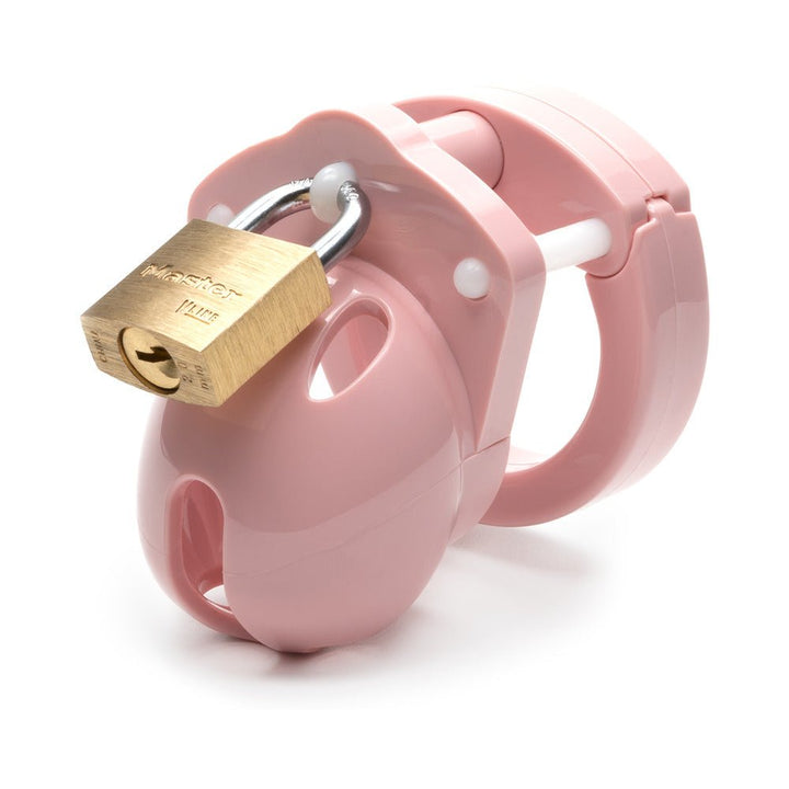 Compact pink male chastity cage with brass lock and vented design for hygiene and comfort.