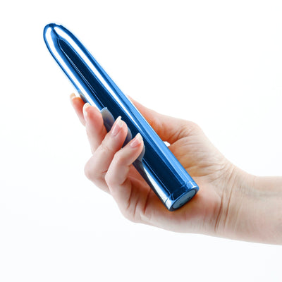 Hand holding a sleek, metallic blue 7-inch rechargeable vibrator with a smooth, rounded design.