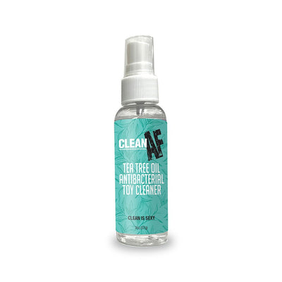Clean AF Tea Tree Oil Antibacterial Toy Cleaner spray bottle with teal label and white spray cap, 2 oz size.