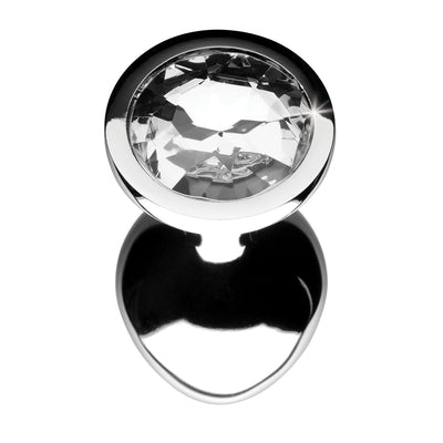 Medium-sized polished metal anal plug with a clear faceted gem at the base, shown on a white background.