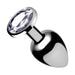 Medium-sized silver metal anal plug with a clear faceted gem at the base on a white background.