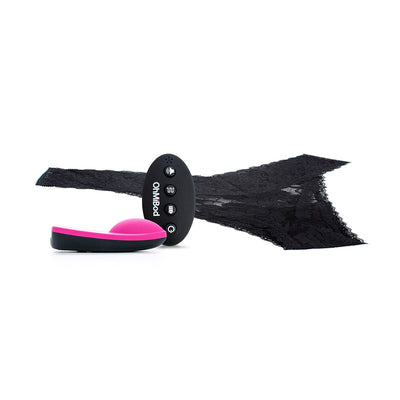 Wireless remote control vibrator with pink and black massager and black lace thong panty on white background