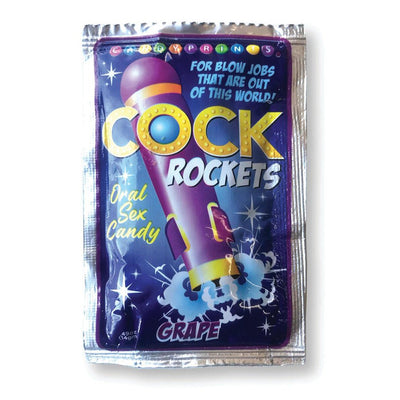 Packet of Cock Rockets grape-flavored oral sex candy with colorful rocket design on purple background