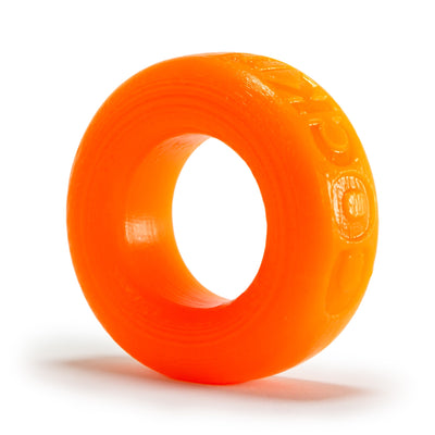 Bright orange flexible silicone cock ring with smooth texture and embossed branding on white background.