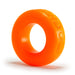 Bright orange flexible silicone cock ring with smooth texture and embossed branding on white background.