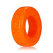Bright orange silicone ring with embossed COCK T branding, designed for comfort and stretch.