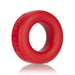 Red silicone cock ring with embossed branding, smooth texture, and a flexible, rounded design.