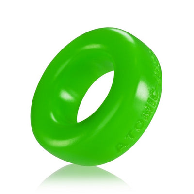 Bright green silicone cock ring with smooth, flexible design and subtle embossed branding on the side.