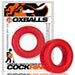 Red silicone cock ring with smooth texture, shown in and out of branded OXBALLS packaging.