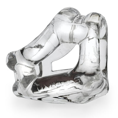 Clear flexible three-ring cock and ball sling made of stretchy Flextpr material with embossed branding.