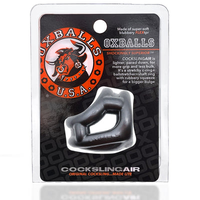 Oxballs Cocksling Air Flextpr black stretchy three-ring sling in clear retail packaging with logo and product details.