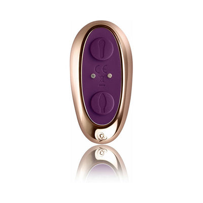 Rose gold and purple remote control for the Cocktail Couples Toy with two buttons and reflective surface.