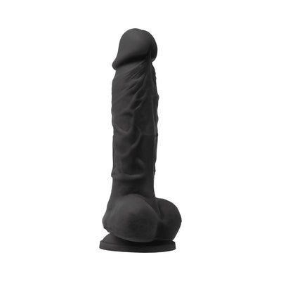 Black 5-inch realistic textured dildo with suction base made from smooth silicone.