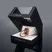White vegan leather choker with rose gold metal ring and engraved plate in black Coquette display box.