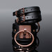 Black vegan leather cuffs with rose gold metal buckles and large O-ring, featuring Coquette engraving and adjustable straps.