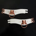 White vegan leather adjustable cuffs with rose gold metal O-rings and buckles, featuring Coquette engraved plates.
