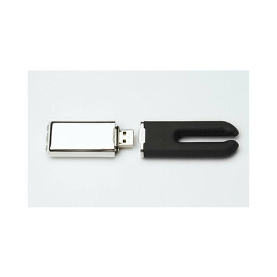 Crave Duet clitoral stimulator with sleek black silicone body and silver USB charging connector detached on white background.