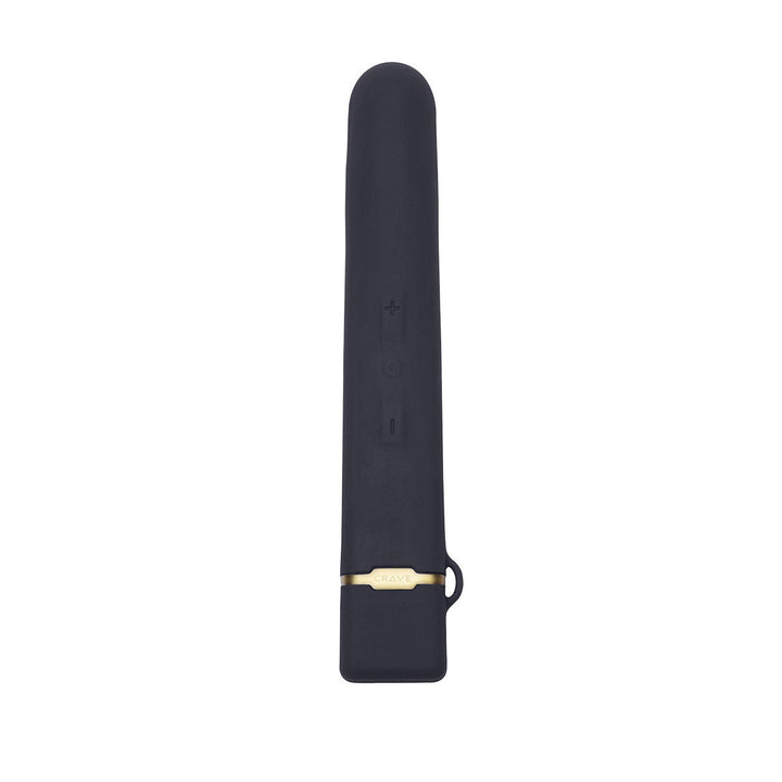 Black flexible vibrator with smooth silicone finish, gold accent, and control buttons on the front.