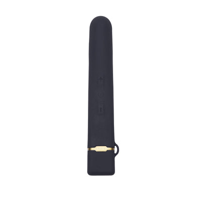 Black flexible vibrator with smooth silicone finish, gold accent, and control buttons on the front.