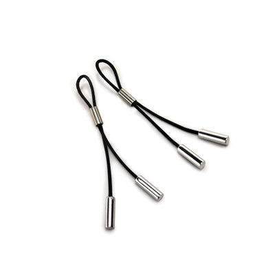 Pair of silver-accented black leather nipple tassels with adjustable loops and metal tips on white background.